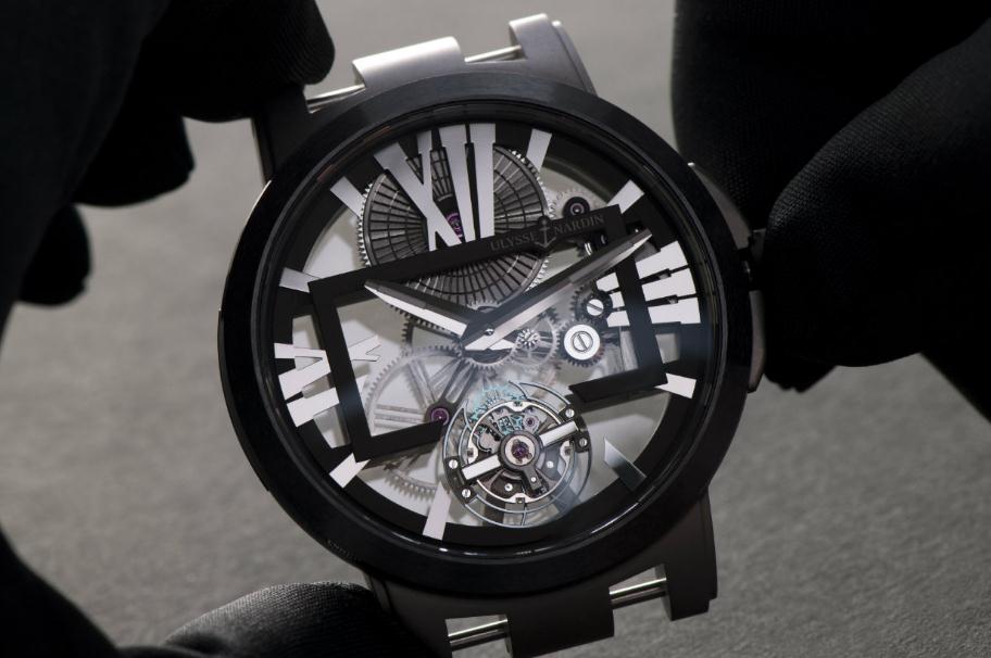 The black titanium fake watches have skeleton dials.