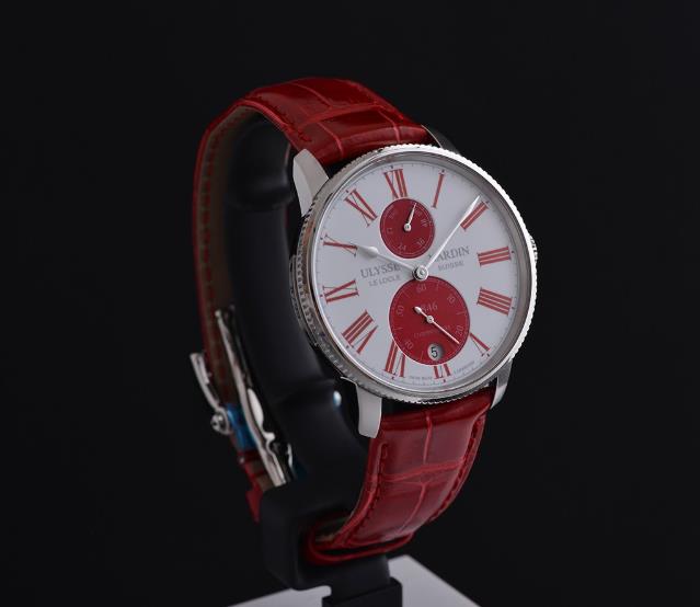 The stainless steel fake watch has a red strap.
