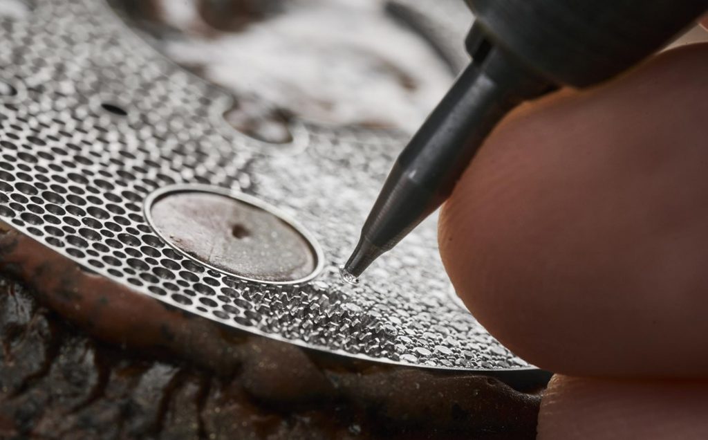 The luxury fake watch is decorated with diamonds.